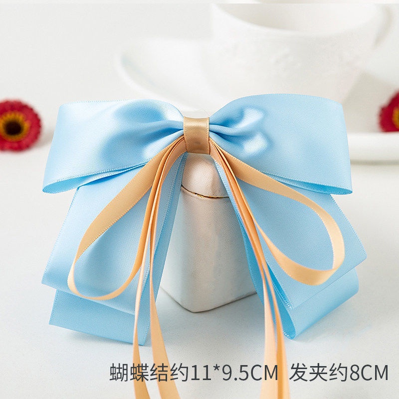 Kẹp tóc nơ nữ tính đơn giản và dễ thương