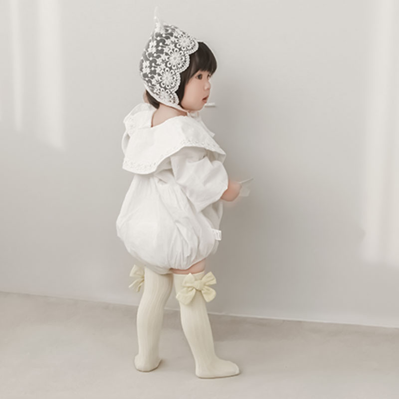 Đôi tất chân cotton dài đính nơ dễ thương cho bé