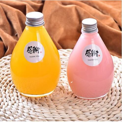 Chai thủy tinh 500ml hình giọt nước nắp nhôm