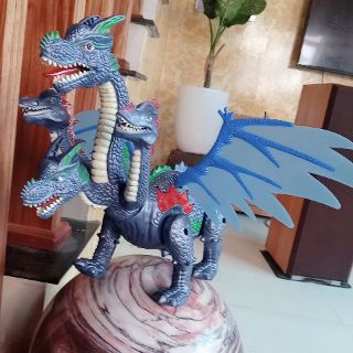 Đồ chơi khủng long 4 đầu đẻ trứng chiếu đèn 3D