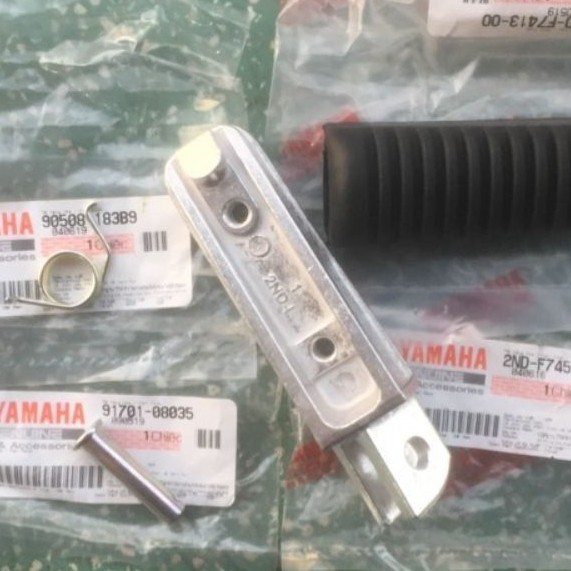 bộ pát nhôm cao su để gác chân trước exciter 150 zin