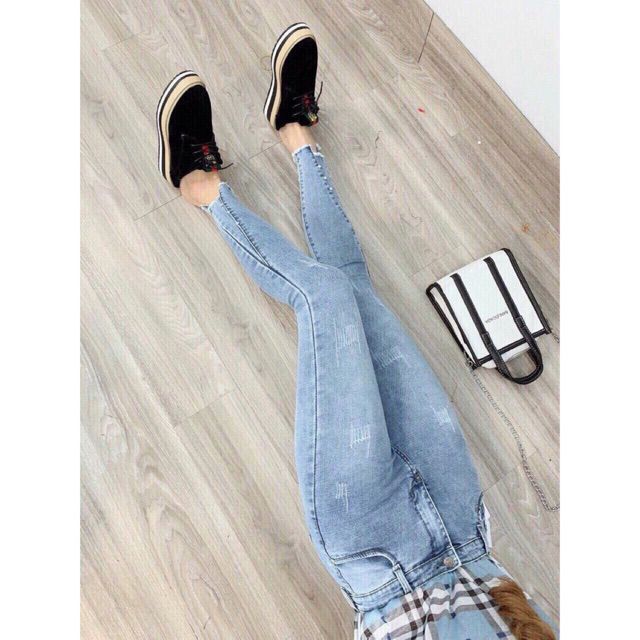 Quần jean nữ bọng gân xẻ tua