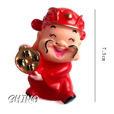 Thần tài ôm tiền vàng một bên