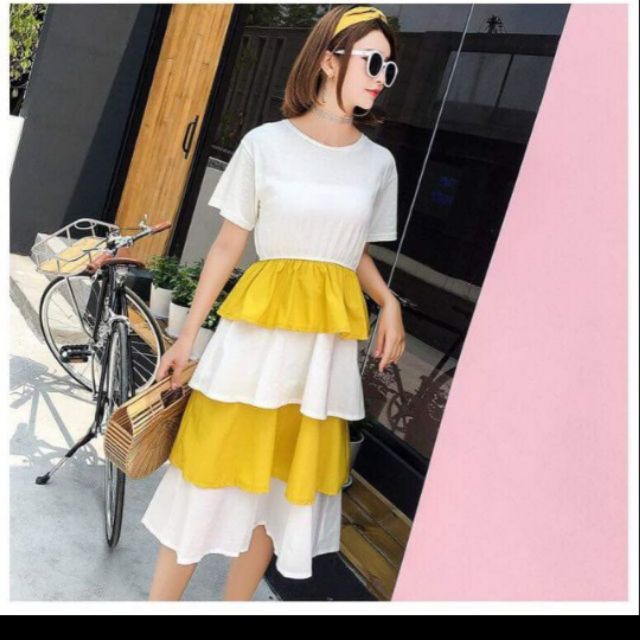 Đầm xoè vàng thanh lý