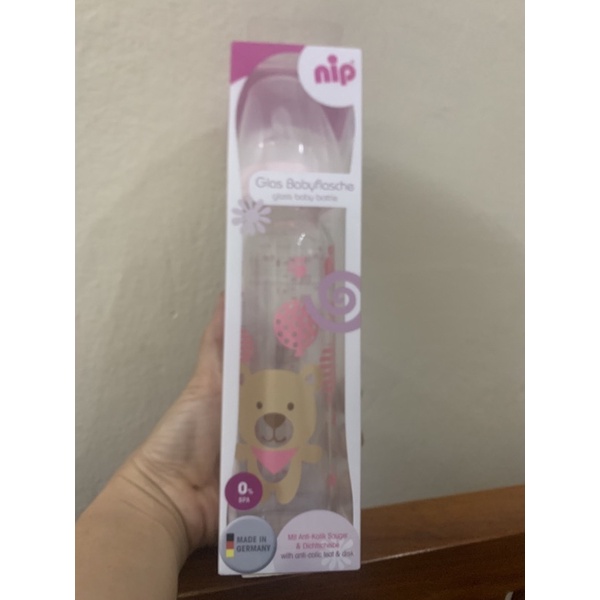 - Bình Sữa Thủy Tinh Cổ Thường núm silicon 250 Ml Cho Bé NIP35071