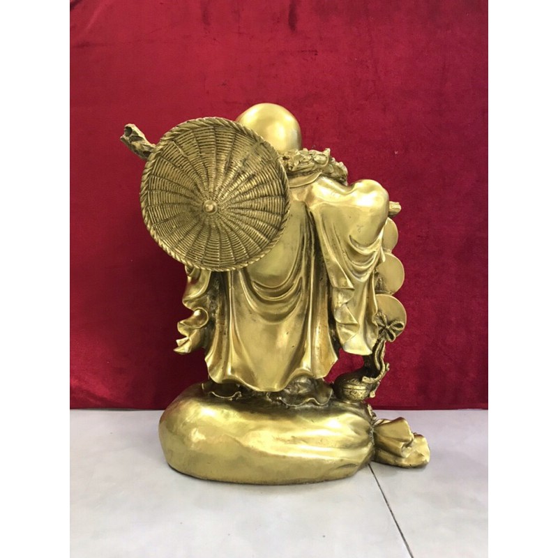 Di Lặc gánh tiền đứng trên bị