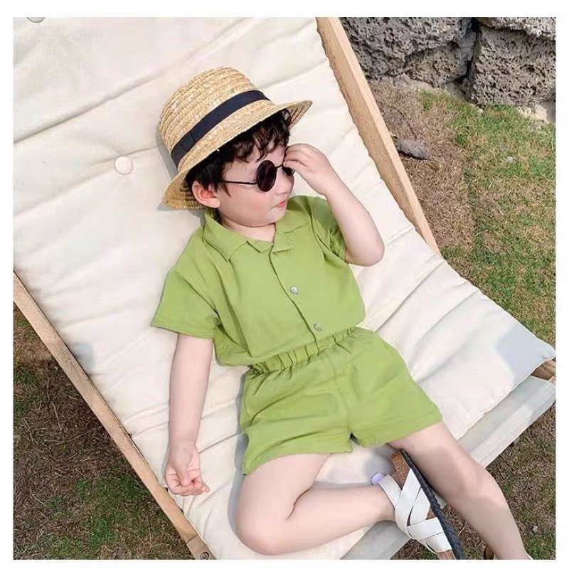 Bộ đũi trơn cổ vest cộc tay đi biển bé trai