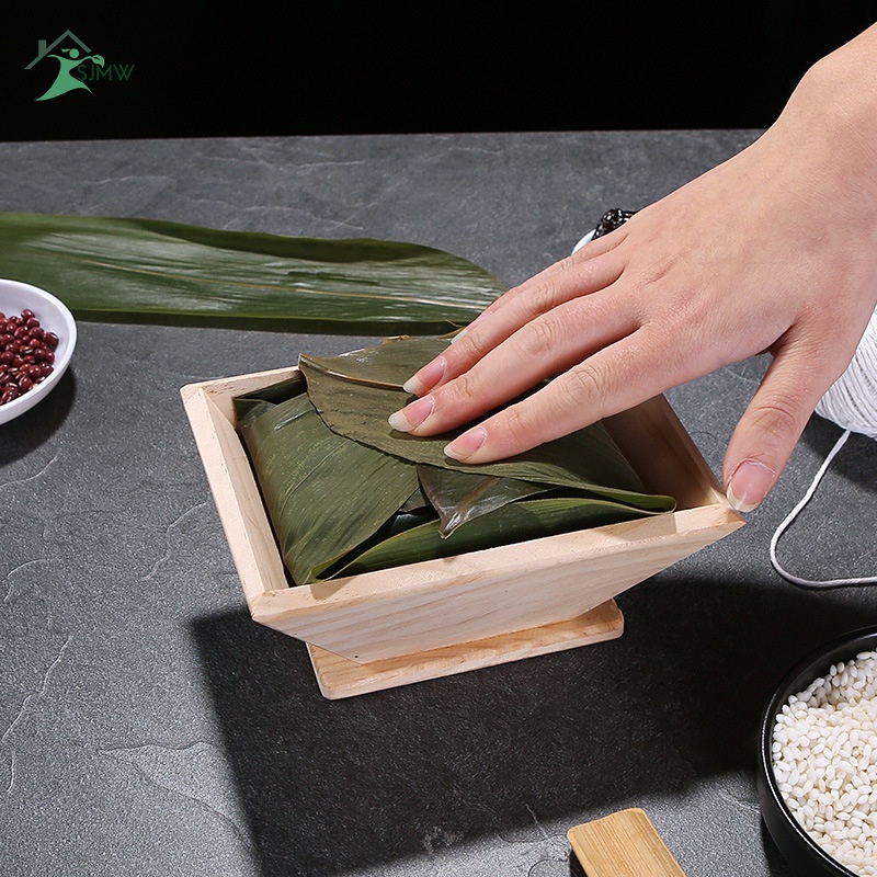 Khuôn gỗ hình tam giác dùng làm bánh bao phong cách Trung Hoa