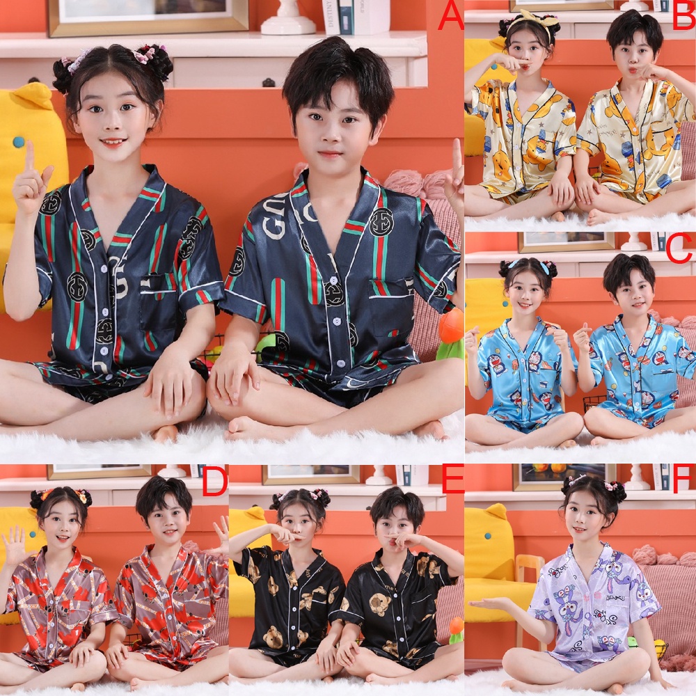 Bộ Đồ Ngủ Tay Ngắn Chất Lụa In Họa Tiết Hoạt Hình Phong Cách Hàn Quốc Thời Trang Cho Bé Trai Và Gái