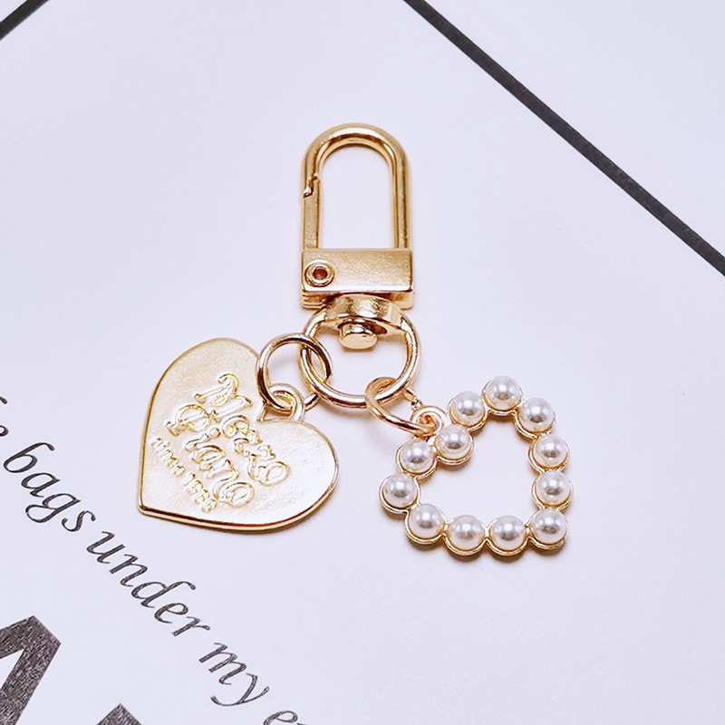 Móc khóa tùy chọn kiểu dáng bằng kim loại sáng tạo