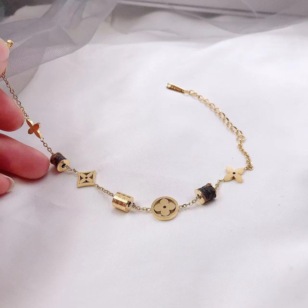 Vòng Đeo Tay Bằng Thép Không Gỉ Mạ Vàng Họa Tiết Hoa Lá Bốn Lá Thời Trang Đơn Giản