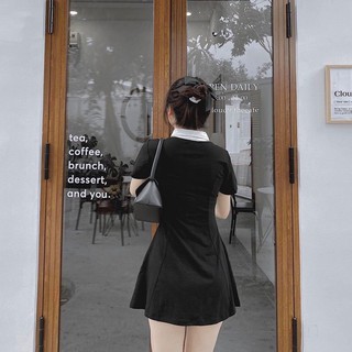 Đầm polo đen viền cổ trắng