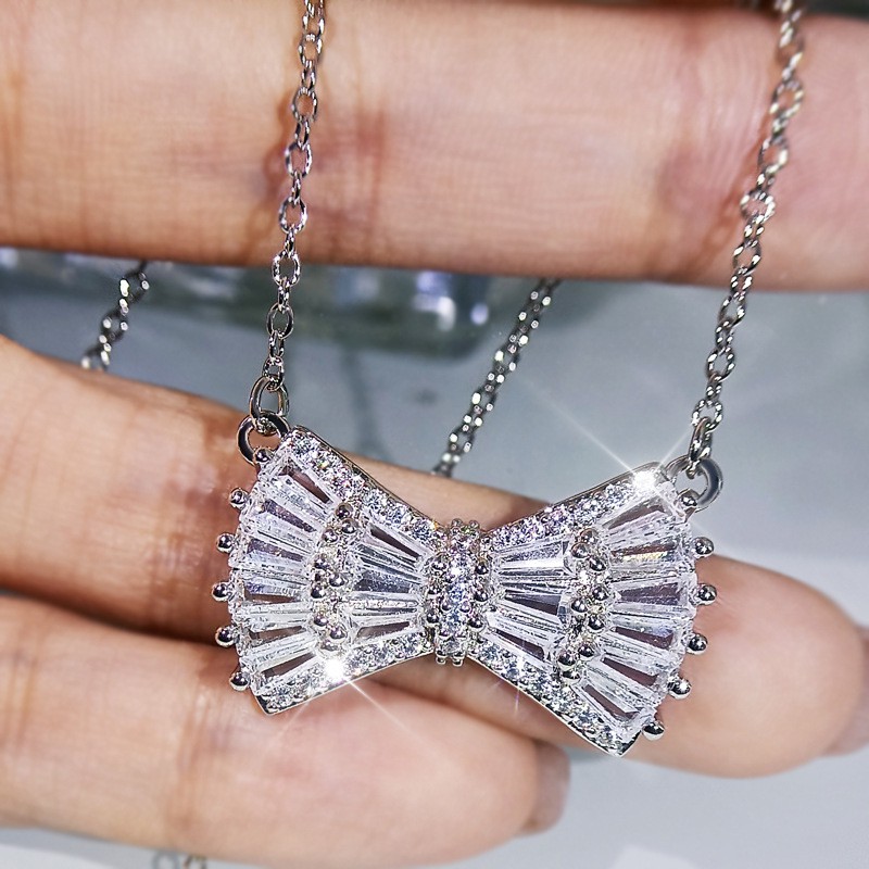 Bộ Dây Chuyền + Bông Tai Mạ Bạch Kim Đính Đá Zircon Hình Nơ Đơn Giản Cho Nữ