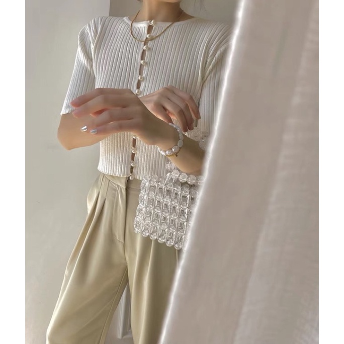 Áo len tăm hàng cúc ngọc cài