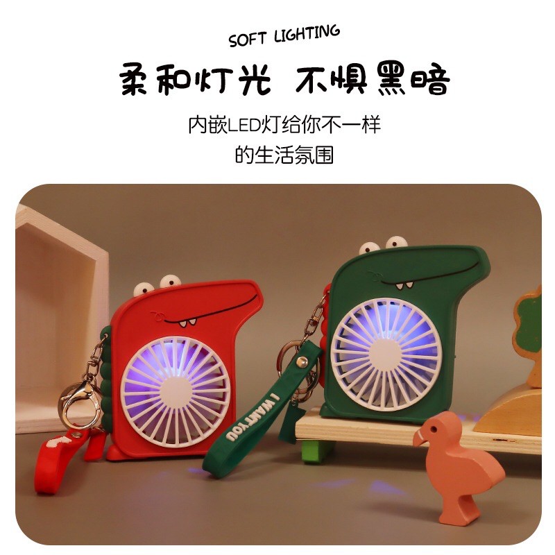 Quạt Cầm Tay Mini Tích Điện Hình Chú Khủng Long Cực Mát Có Đèn (Tặng Kèm Phụ Kiện) | BigBuy360 - bigbuy360.vn