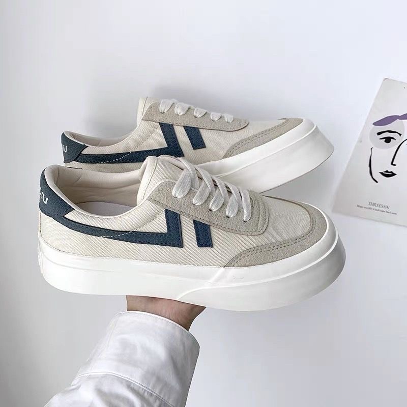 Giày vải thể thao viền xanh