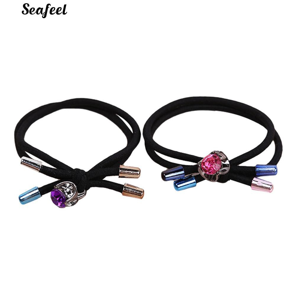 Thun cột tóc đính đá.