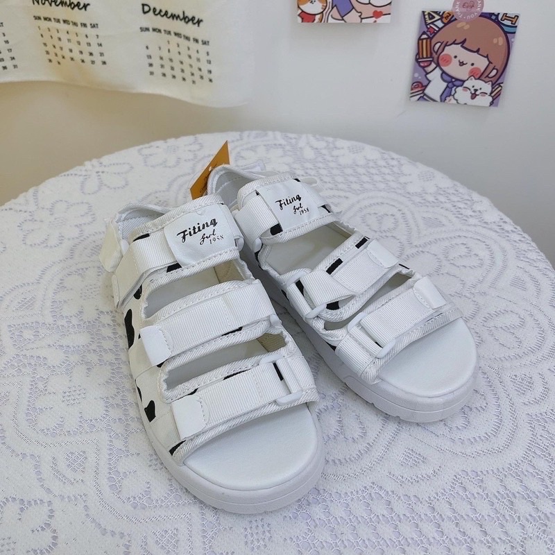 Sandal đi học hoạ tiết bò sữa quai điều chỉnh siêu xinh