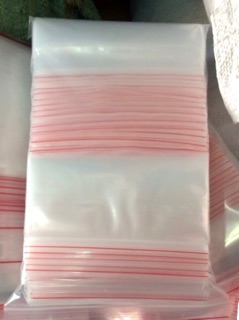 1KG - TÚI ZIPPER CHỈ ĐỎ (HÀNG DÀY, ĐẸP)