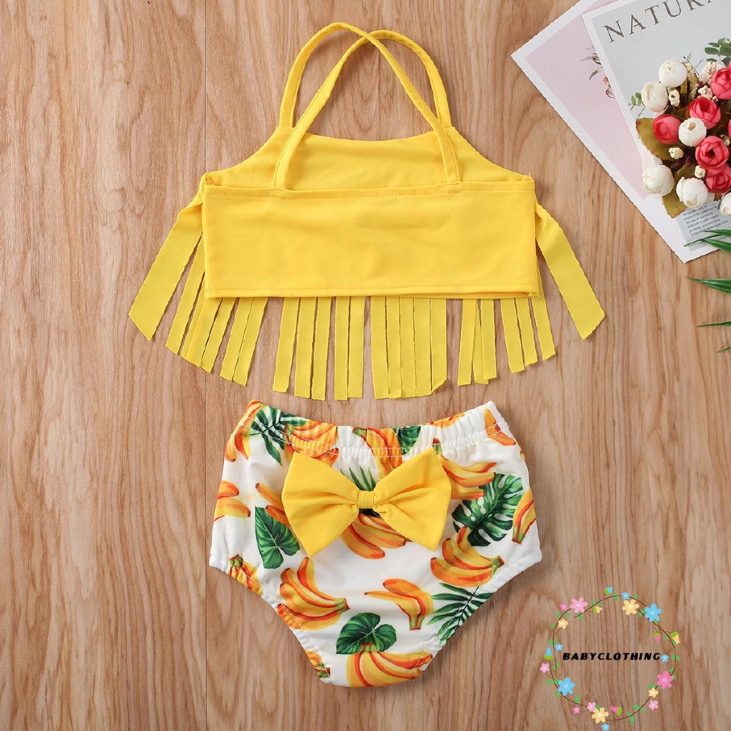 Set đồ bơi phối tua rua in hình trái chuối cho bé gái
