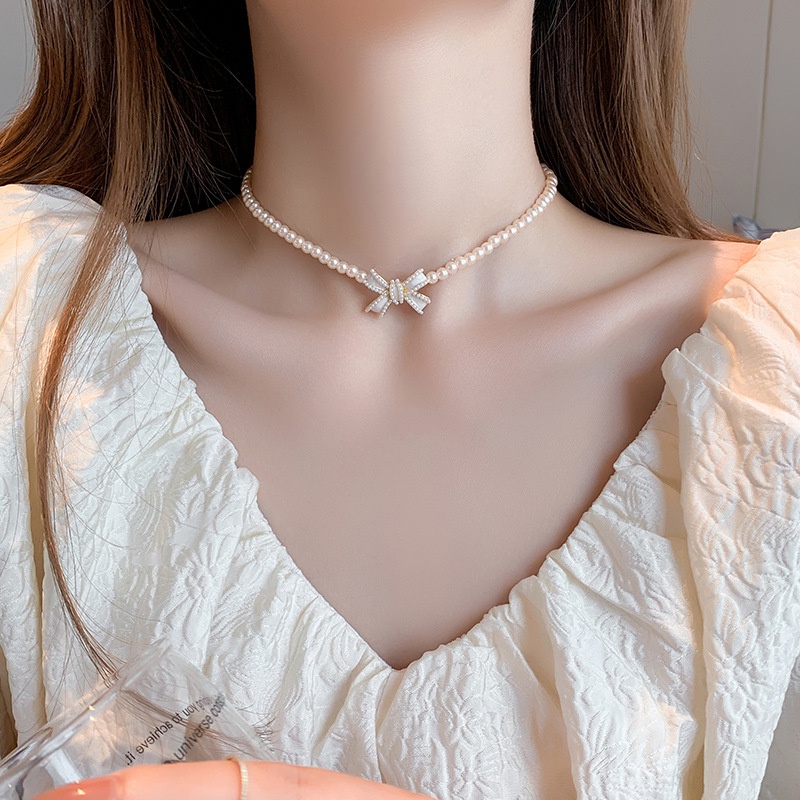 Bộ Vòng cổ + Bông Tai Hình Nơ Đính Ngọc Trai Nhân Tạo Thời Trang Hàn Quốc