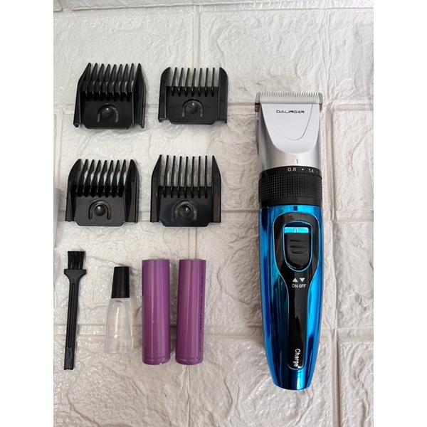 Tông đơ cắt tóc DALING 110 tặng kèm 01 pin sạc dự phòng, 1 áo choàng cắt tóc