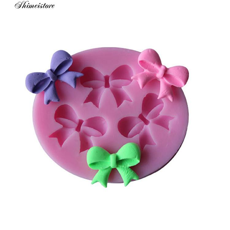 Khuôn Làm Bánh / Sô Cô La Bằng Chất Liệu Silicone Hình Nơ Xinh Xắn