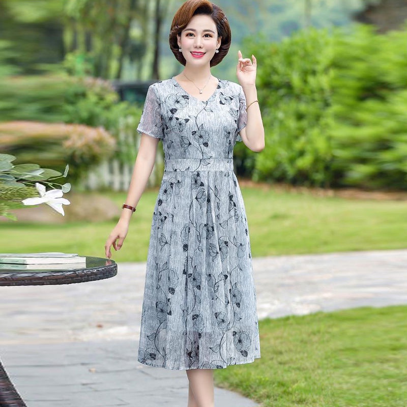 ﺴ▲Mẹ trung niên váy ngắn tay mùa hè voan cho bà 50 tuổi dài qua gối phụ nữ và cao
