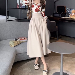 Chân váy dài qua gối cạp cao dáng xòe