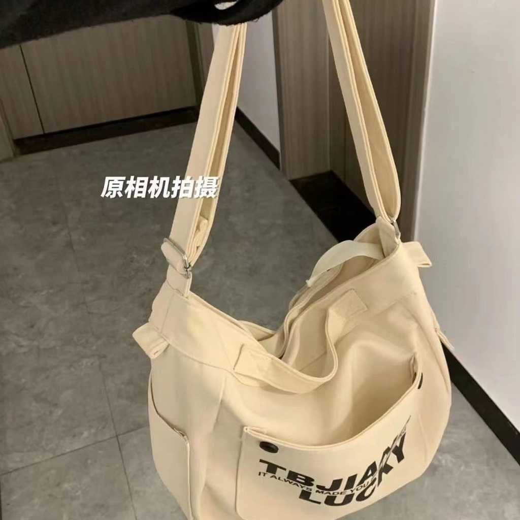 Túi Đeo Chéo Vải Bố Sức Chứa Lớn In Chữ Cái Phong Cách Đại Học Mới Dễ Phối Đồ Giảm Xóc
