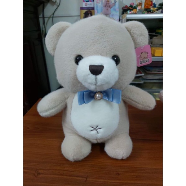 Gấu Teddy đeo nơ ngọc