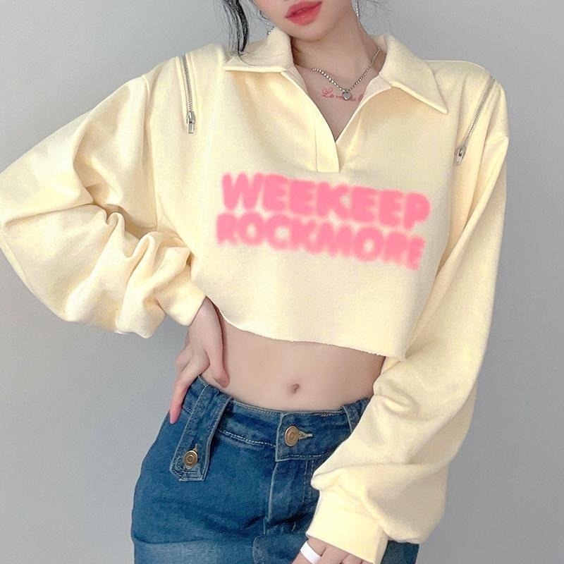 Áo Sweater nữ tay dài dáng rộng có dây kéo in chữ thời trang
