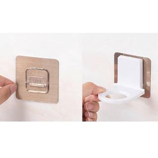 A space-saving multi-purpose kitchen / bathroom wall-mounted bottle holder