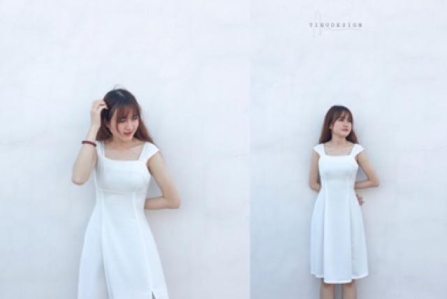 Đầm thiết kế trắng dài vai trễ, rùn ngực
