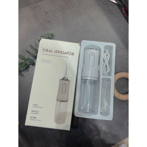 máy tăm nước Oral Irrigator