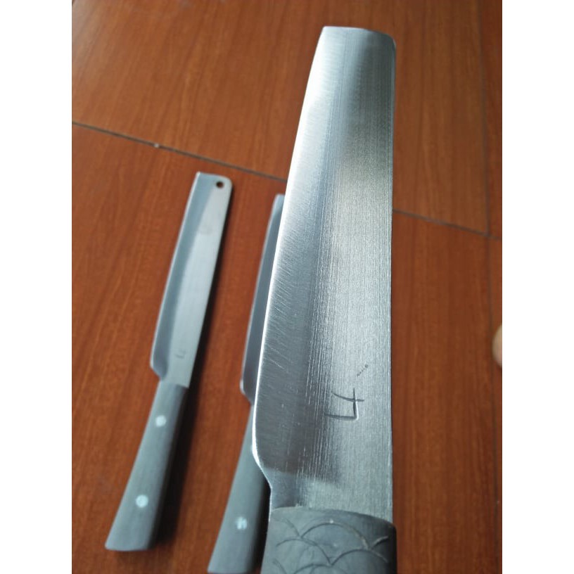 Dao thái nhỡ thép trắng không gỉ Nhật Bản.