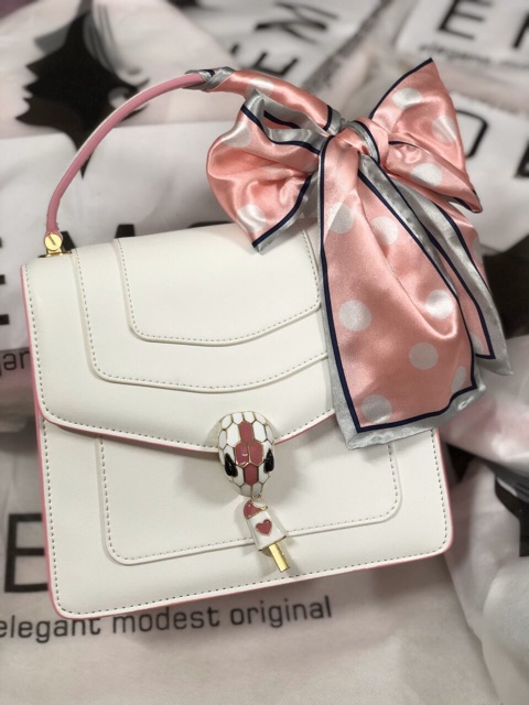 Túi Emo đầu rắn có sẵn 4 mầu . Kèm khăn siêu xinh