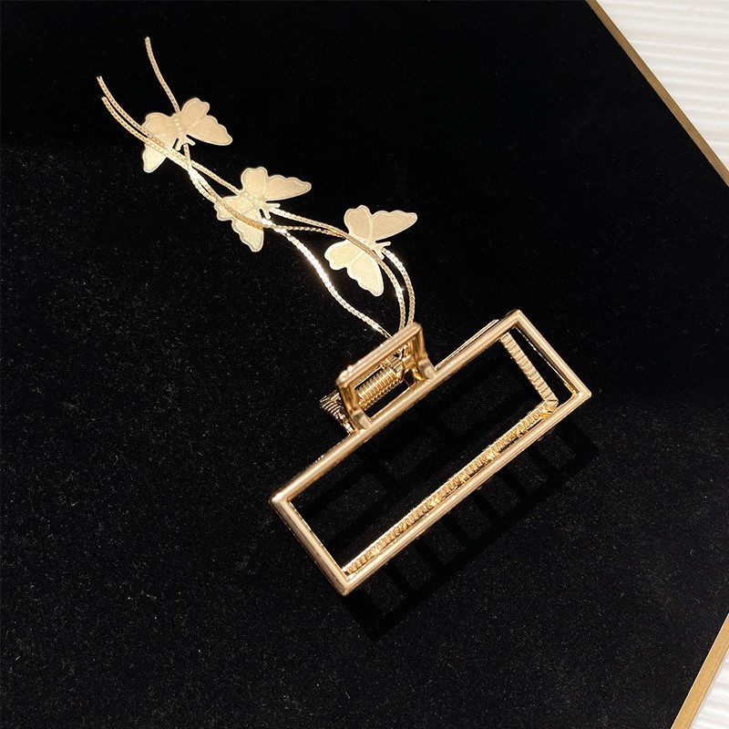 Kẹp tóc bằng kim loại hình bướm đính pha lê sang trọng