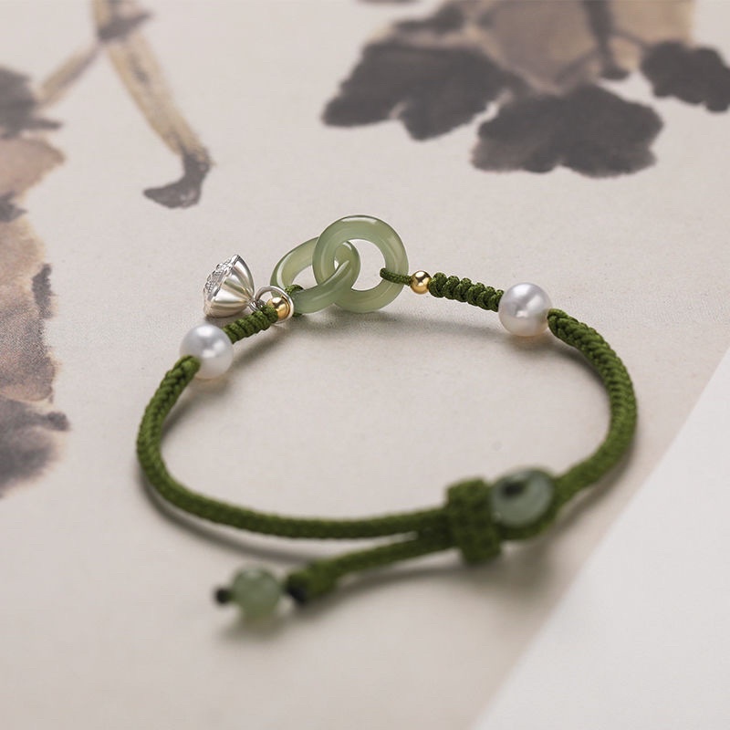 Vòng tay charm đài sen ngọc định mệnh