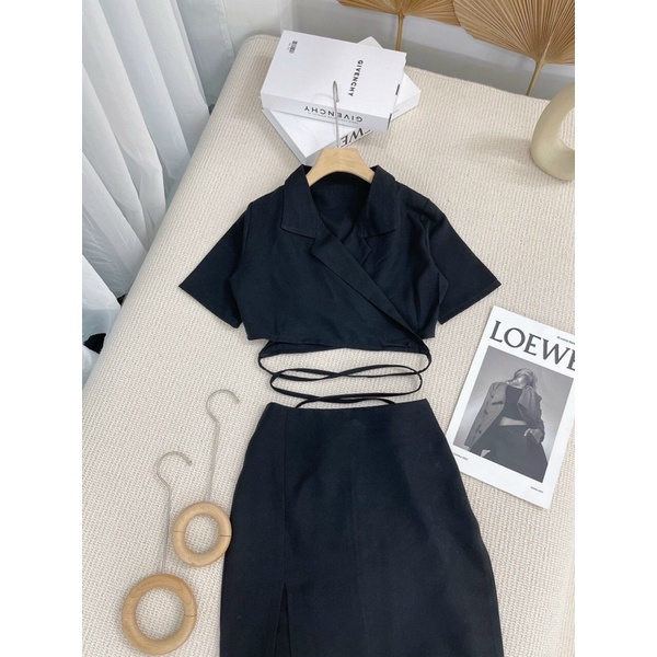 Set áo croptop cổ vest quấn eo + chân váy midi xẻ đen