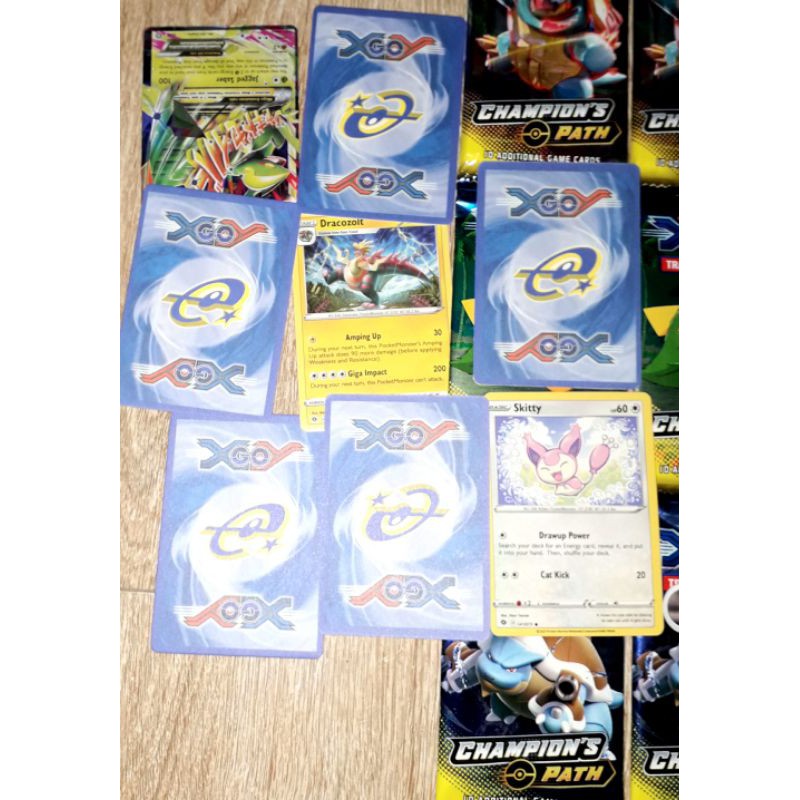 sét 12 pack có 96 thẻ bài Pokemonn_Champion Path VMax bằng giấy bóng cứng óng ánh tiếng Anh
