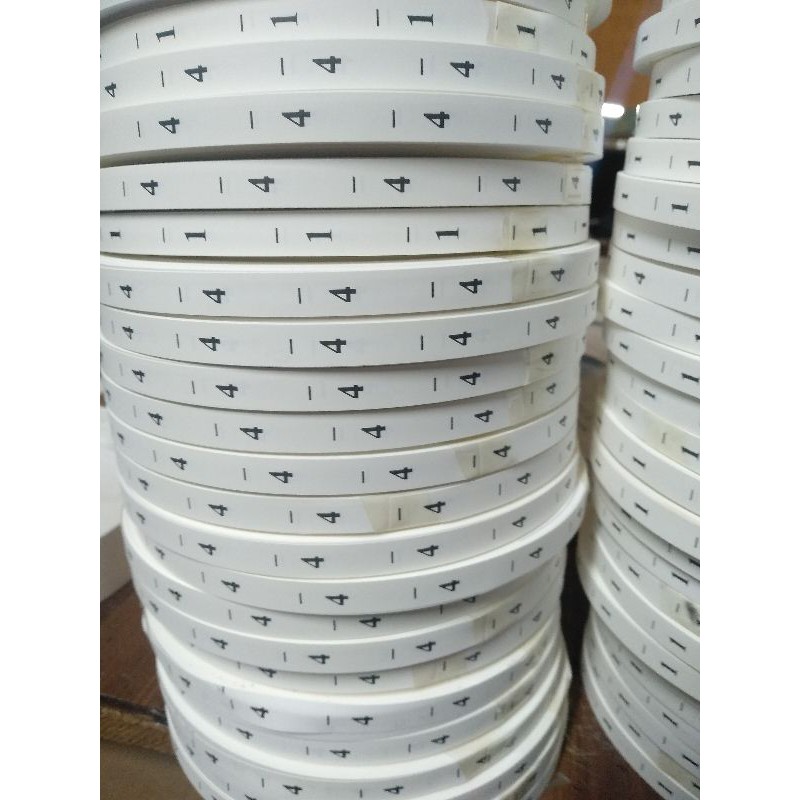 Cuộn mác size, Mác số quần áo chất liệu vải giấy,mực in sắc nét.