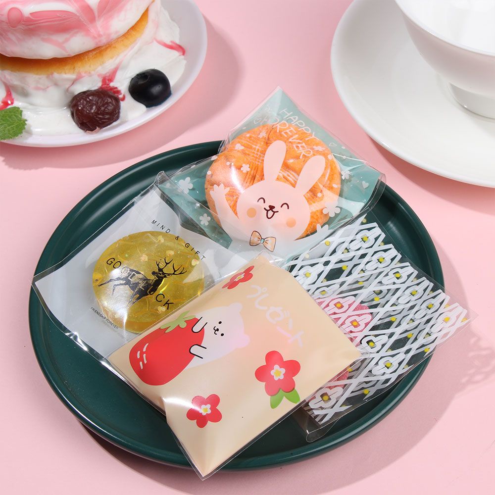 Set 100 túi đựng bánh quy/ kẹo in họa tiết hoạt hình 7 x 7+3cm DIY