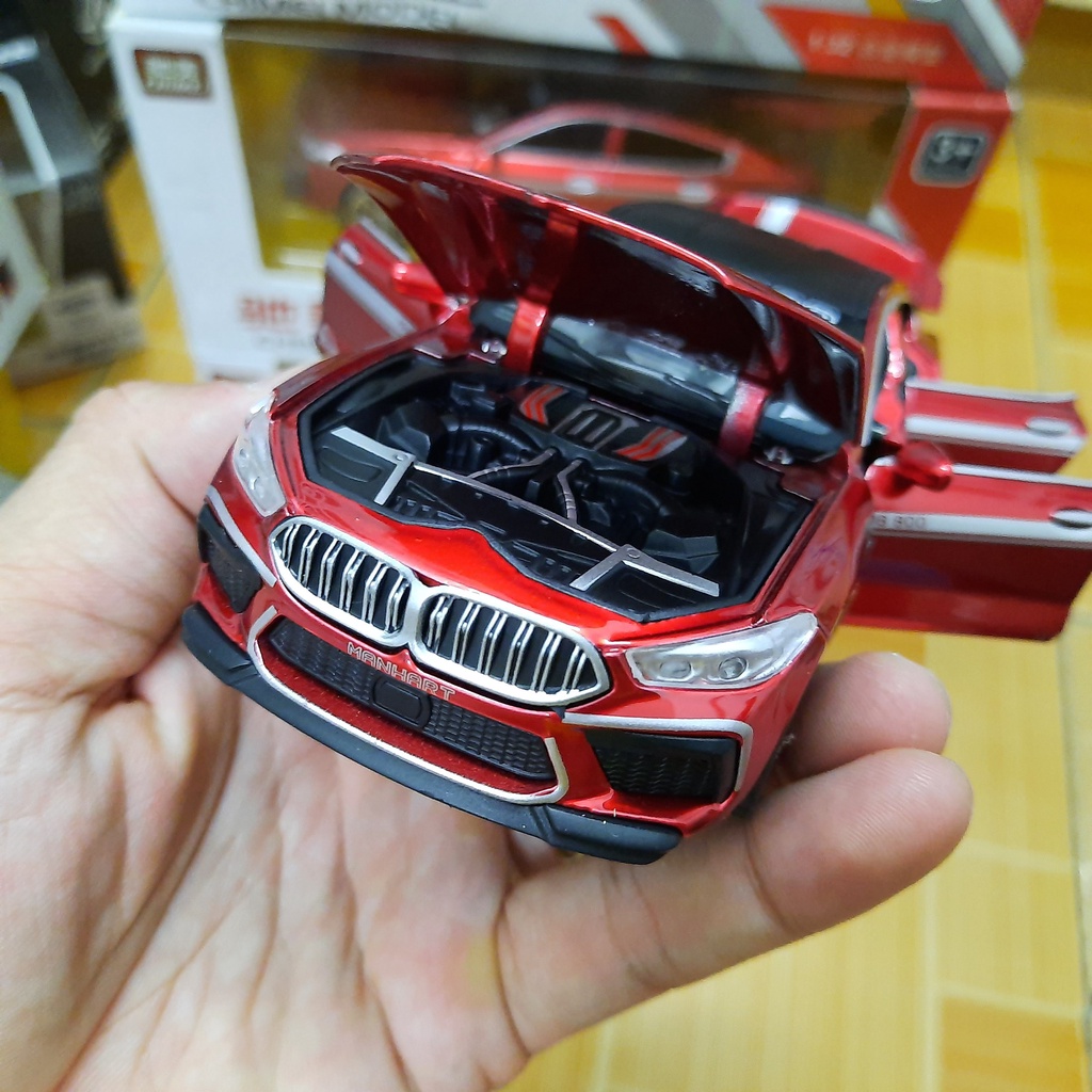 Mô hình xe ô tô BMW M8 tỉ lệ 1:32 bằng kim loại mở full các cửa