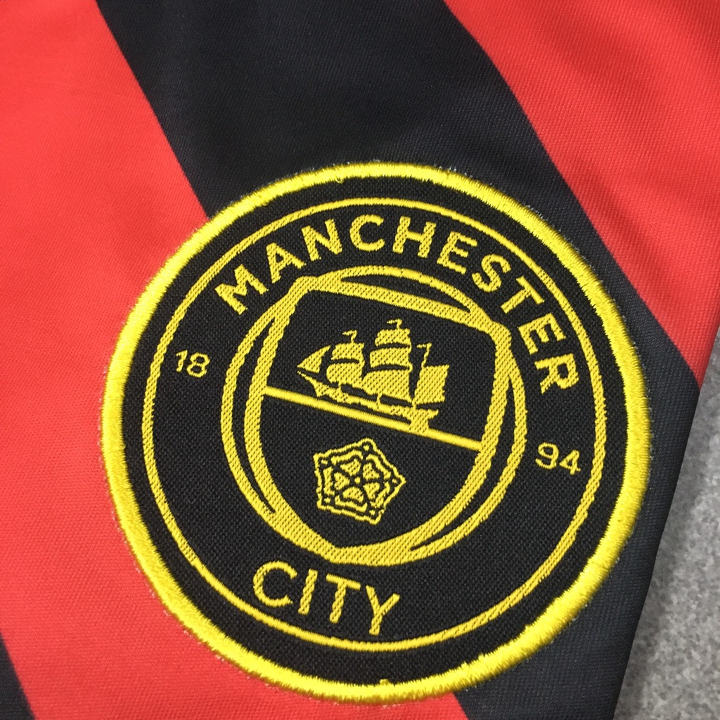 Bộ quần áo bóng đá Man City sọc đen đỏ sân khách JP 2023 FLG