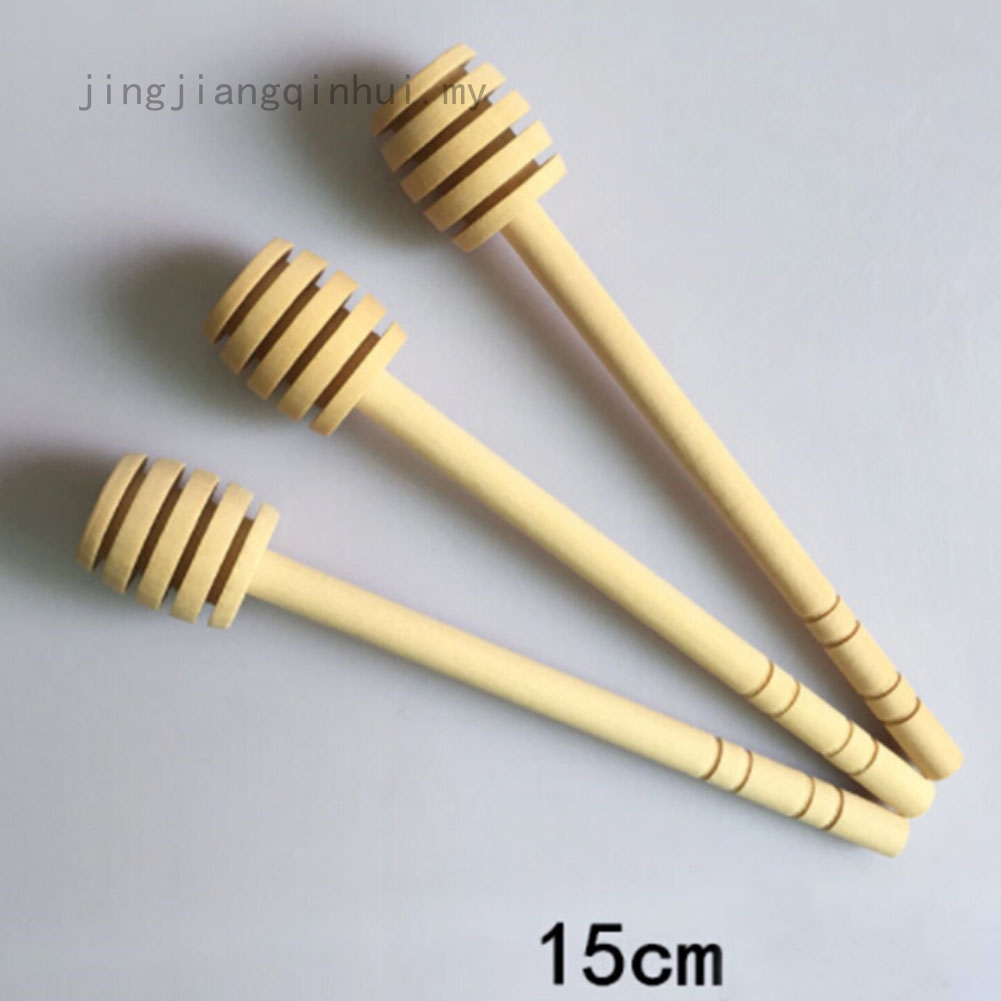 1 chiếc muỗng gỗ múc mật ong