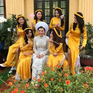 Áo dài phi bóng vàng - Giá xưởng