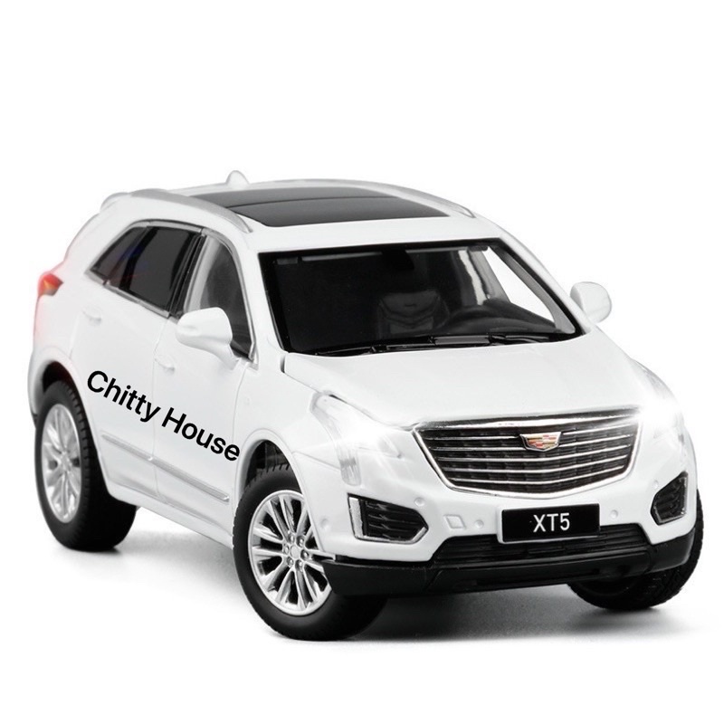 MÔ HÌNH XE CADILLAC XT5 1:32 JACKIEKIM, đánh lái 2 bánh trước, đèn còi âm thanh,