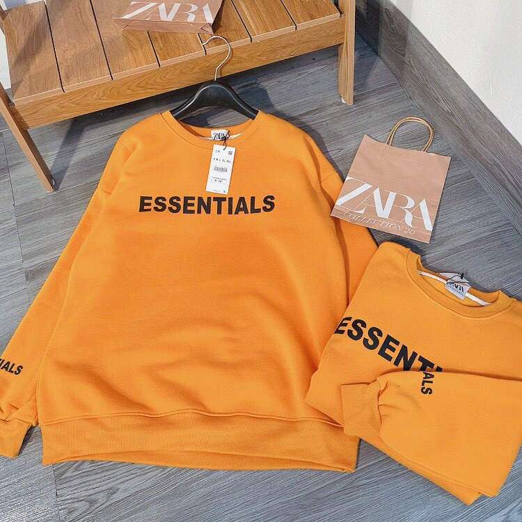 Áo nỉ cam essentials