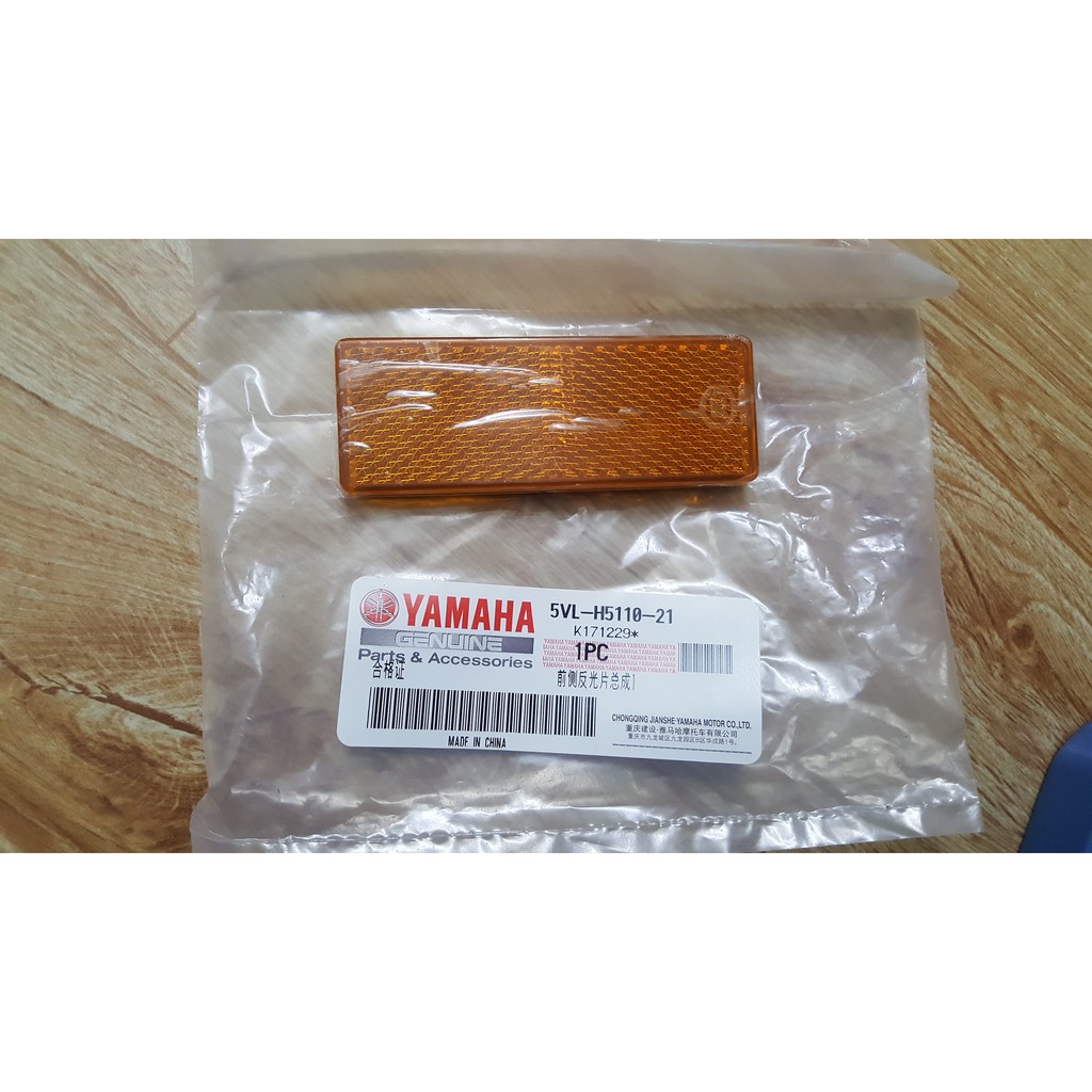 phản quang giảm xóc trước yamaha yb125sp